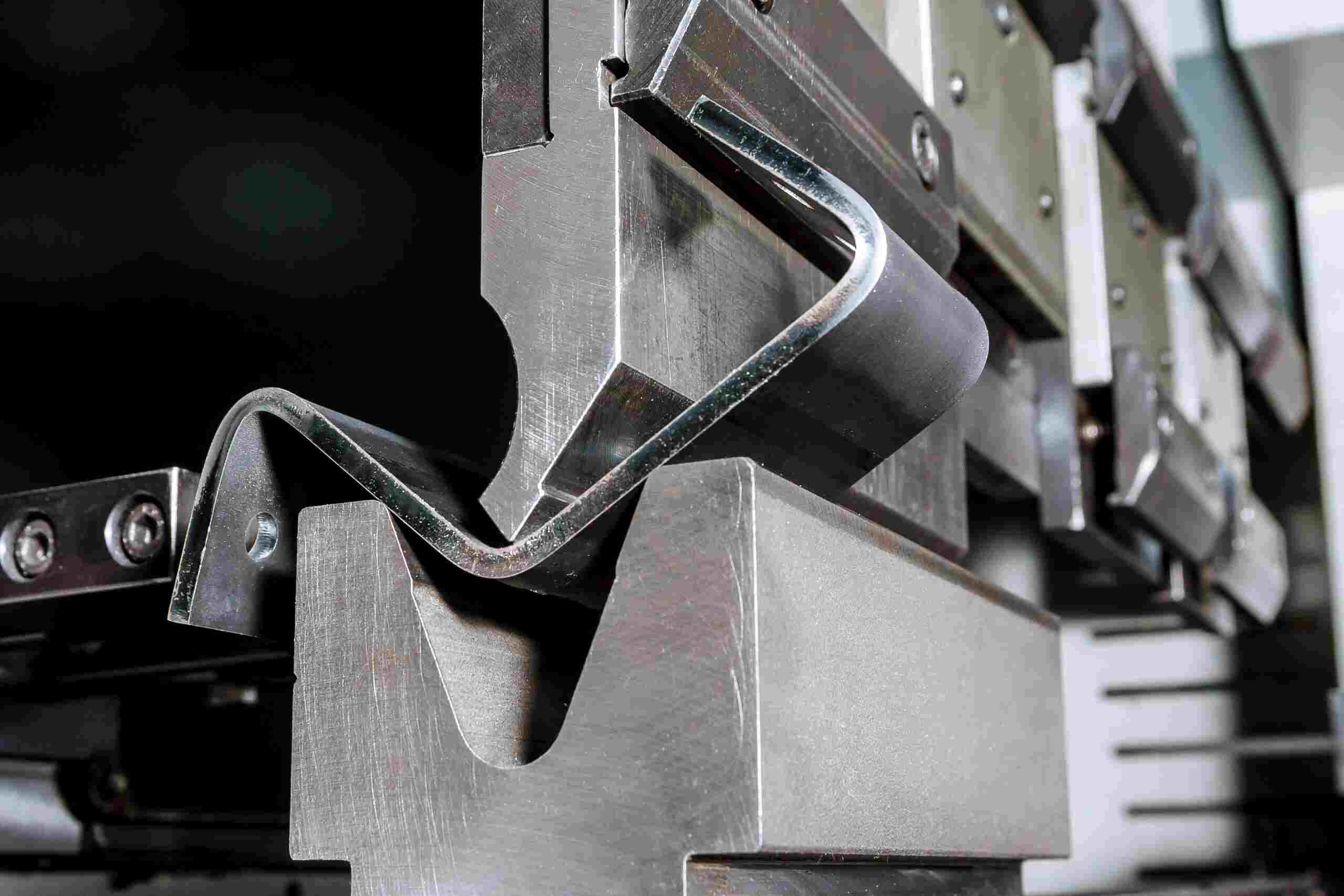 Press brake operator bending sheet metal